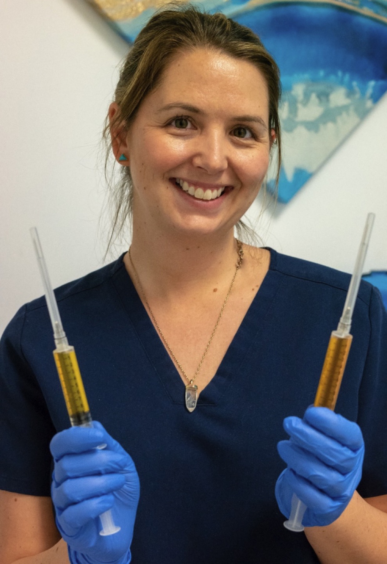 Dr. Sarah smiling in the Chandler clinic