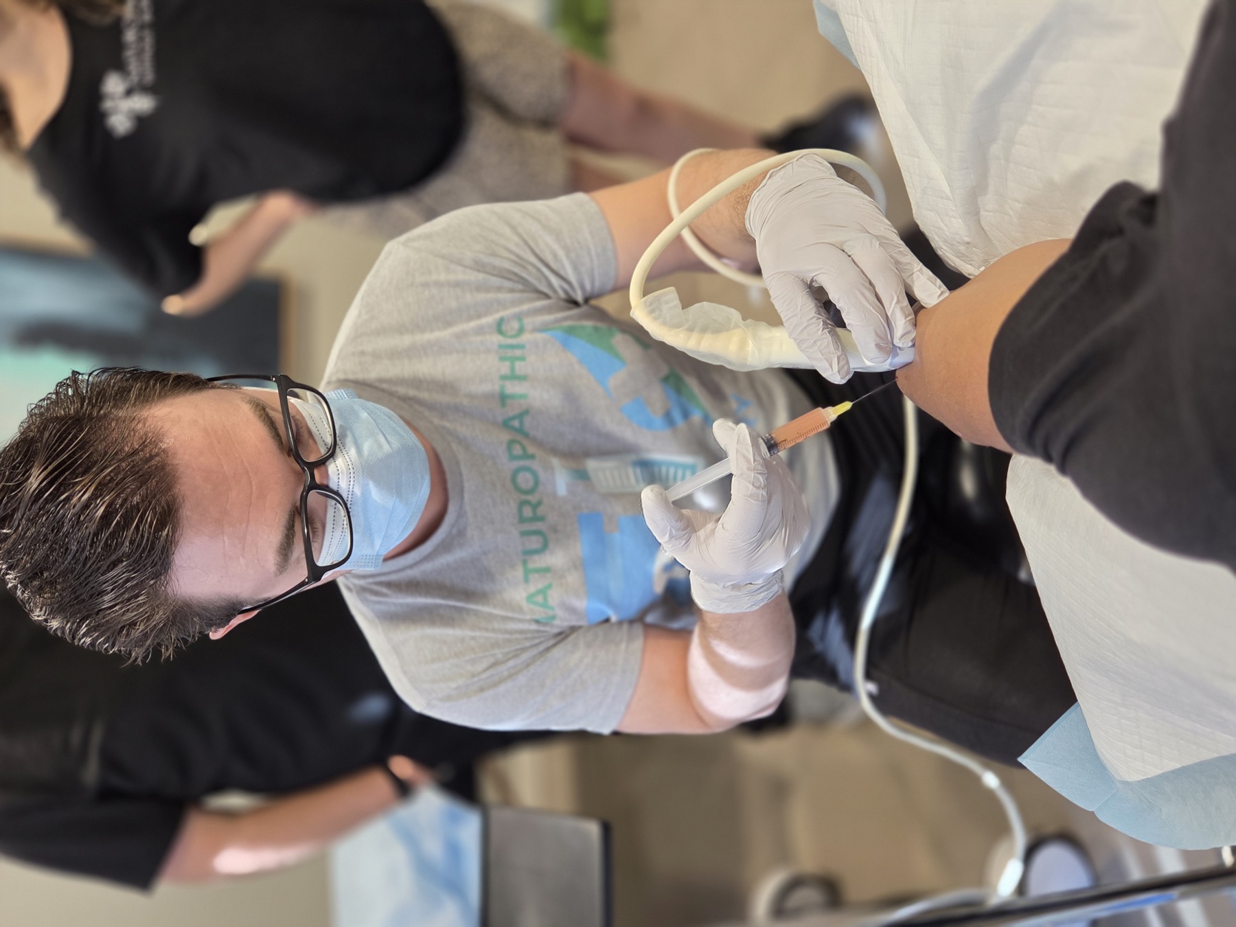 Dr. Sean teaching an ultrasound-guided PRP injection